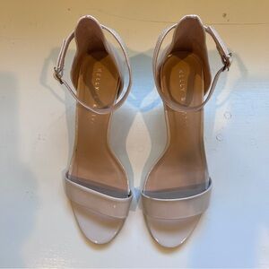 Patent leather dress sandal.